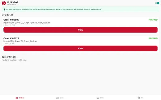 A rider's view of their current deliveries in progress, showing order numbers, addresses, item counts and payment status.