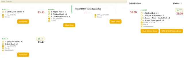 The kitchen display after a cook marks a ticket done, showing the confirmation toast and the reduced count of active tickets.